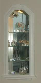 in the wall arch top curio cabinet 18 inch high