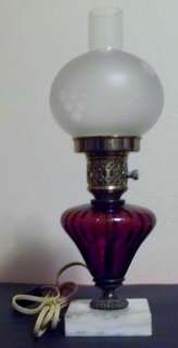 Antique electric hurrican lamp on marble base  