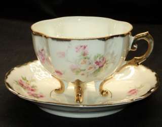 ANTIQUE BOHEMIAN ROSES Tea cup and saucer 4 FOOTED GOLD  