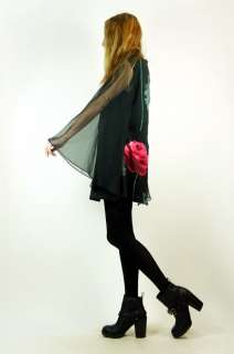 DESCRIPTION Vintage 70s black mini dress. Bold rose flower print dawns 