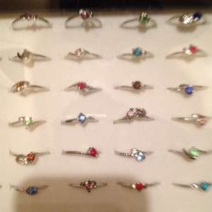   RINGS * ASST STYLES * SIZES * COLORS * IN DISPLAY BOX * TEENS *  