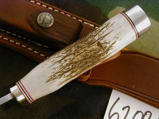 stag handle duraluminum butt cap with wrist thong brown sheath call 