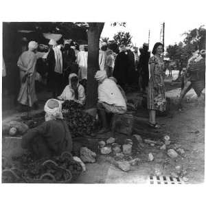  Woman,wearing western dress,tomato vendors,outdoor market 