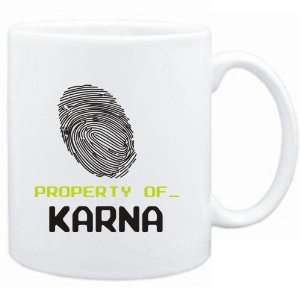  Mug White  Property of _ Karna   Fingerprint  Female 