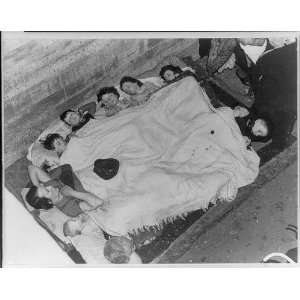   Family,Sleeping,one bedspread,Air Raid shelter,London