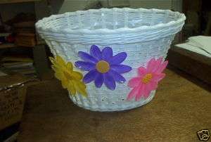 Plastic bicycle basket with flowers  