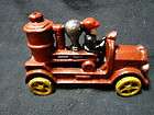 old CAST IRON toy FIRE ENGINE 2 Fireman 2 LADDER TRUCK rubber tires c 