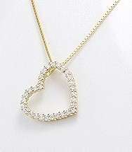 perfectly sweet this petite size heart pendant necklace is adorned 