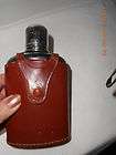   brown leather covered rico liquor flask england silvertone covered