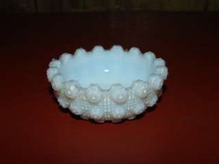   is a white milk glass open salt. It measures 2 1/4 tall and 1 tall